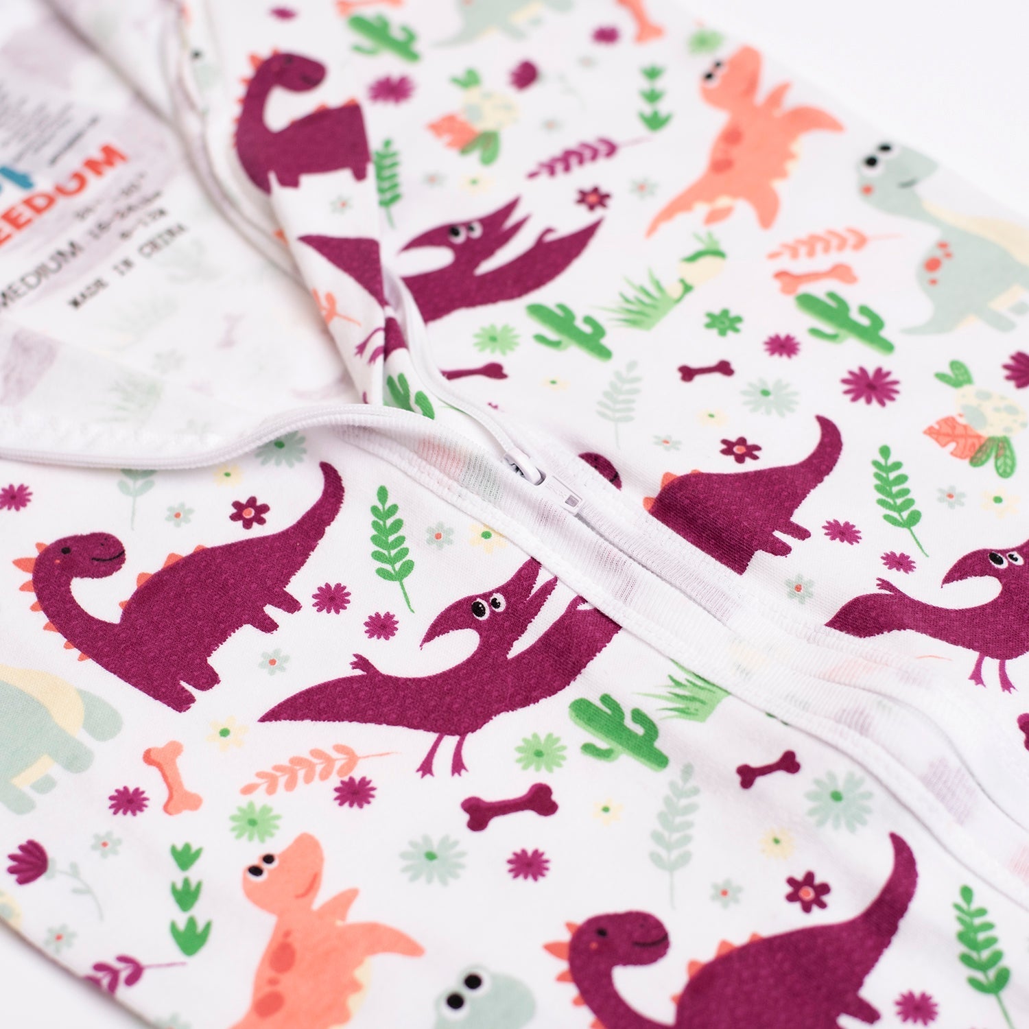 Girl Dino Zippy Freedom Swaddle Transition